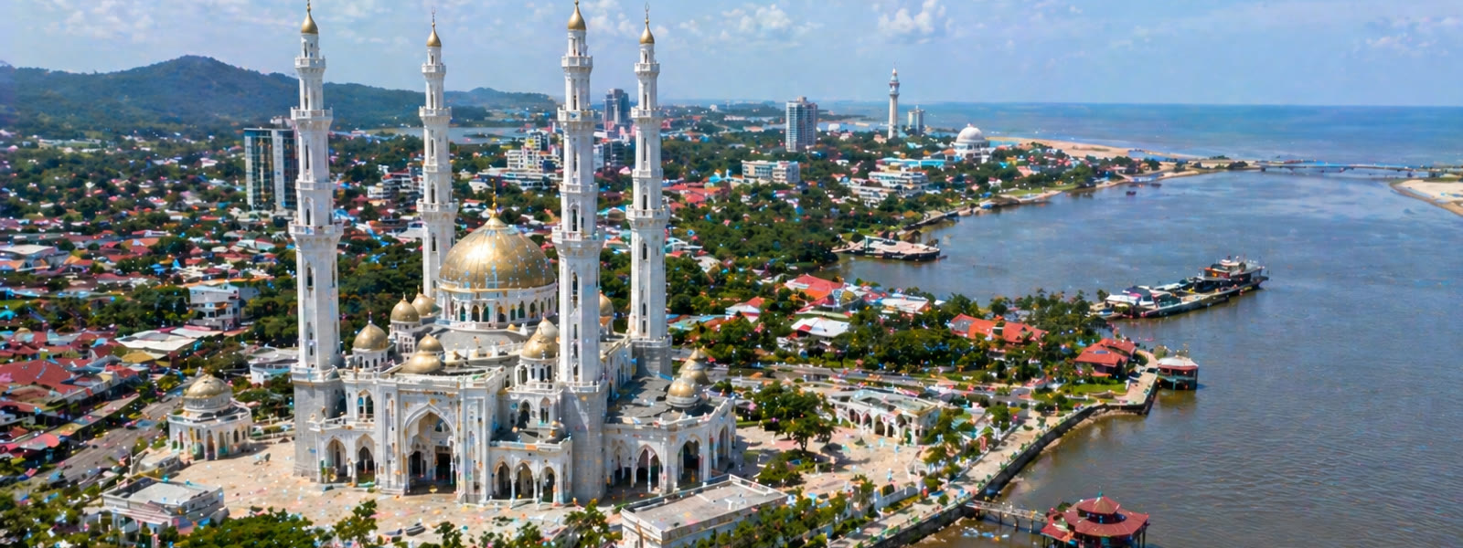 Crystal Mosque on Wan Man Island with Kuala Terengganu skyline along the Terengganu River